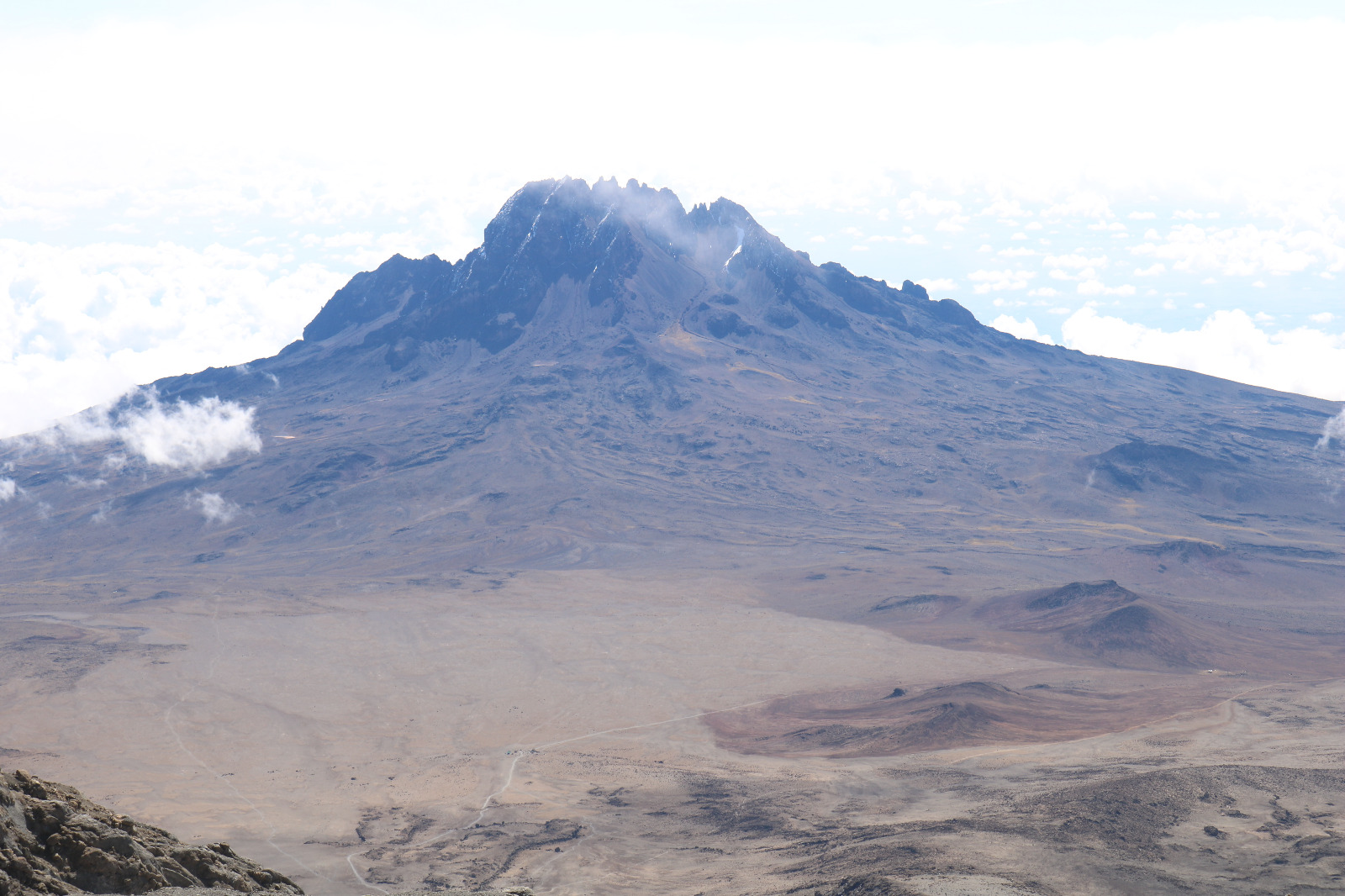 Witnessing the raw, volcanic beauty of the Alpine Desert. This view of Mawenzi Peak is one of the many rewards of taking the high road on Kilimanjaro. Truly a moonscape on Earth.

Who’s ready to conquer the Roof of Africa in 2026? 
📩 Email: info@rockyafricaexperience.com
📞 Call/WhatsApp: +255 713 550 312
🌐 Explore more: www.rockyafricaexperience.com

#MountKilimanjaro #Mawenzi #TanzaniaSafari #TrekkingAdventure #RoofOfAfrica #VisitTanzania #MountainPhotography #Kilimanjaro2026